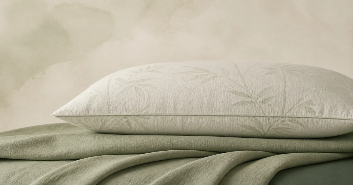 Soft flat illustration of a bamboo-cover shredded foam pillow on calm bedding